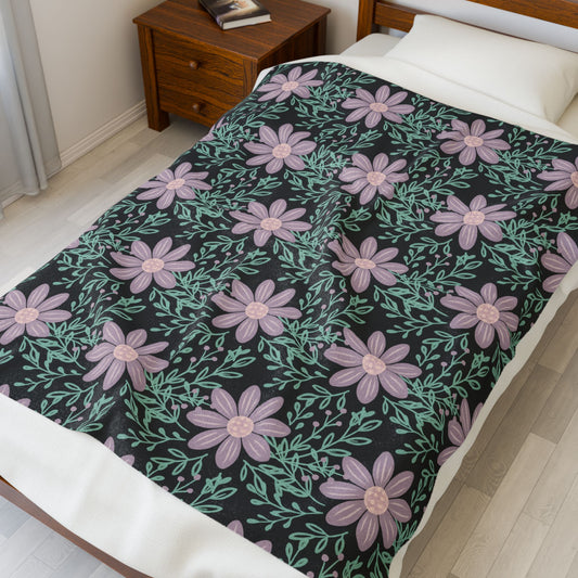 This velveteen plush blanket features a chalkboard wildflower design, giving a cozy and rustic feel to any room. Perfect for adult buyers looking to add a touch of nature to their home decor or gift during holidays, birthdays, or housewarmings.